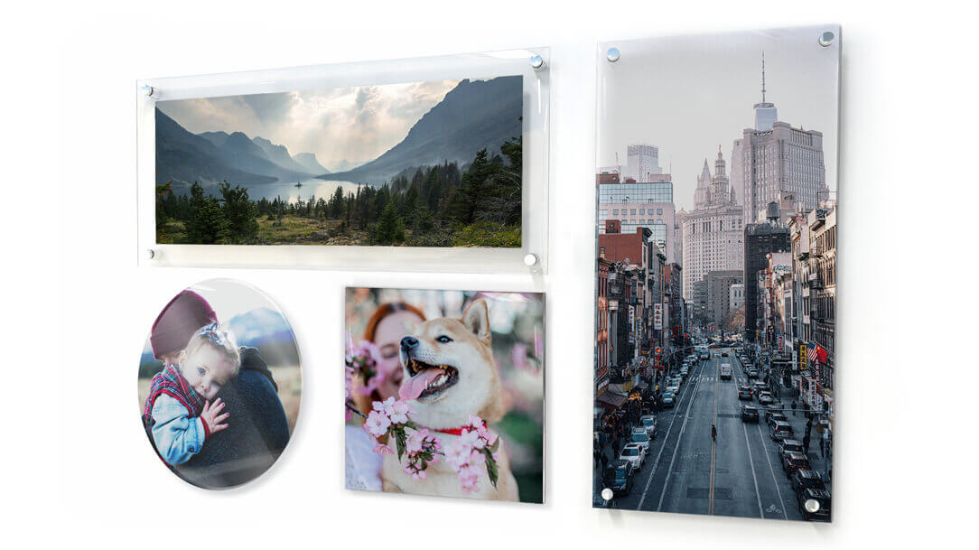 Acrylic photo prints in different shapes mounted on a wall