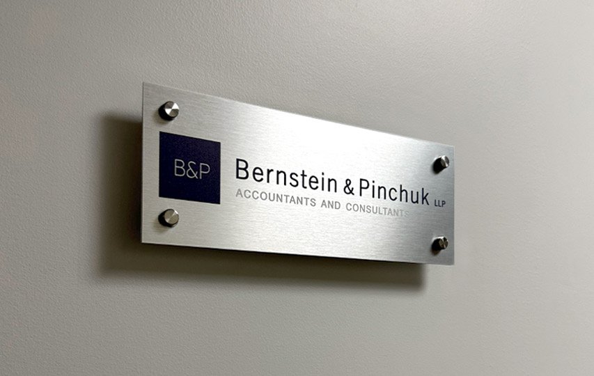 Brushed aluminum signs