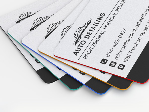 Painted edge business cards for an auto detailing company, featuring contact details