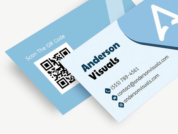 Standard business cards in light blue, featuring a brand name and contact details